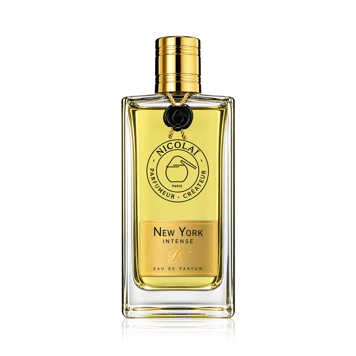 A rectangular glass perfume bottle filled with pale yellow liquid, featuring a gold cap and a gold front label that reads 'Nicolai' and 'New York Intense Eau de Parfum'. The bottle is centered on a clean white background with a subtle reflection below.