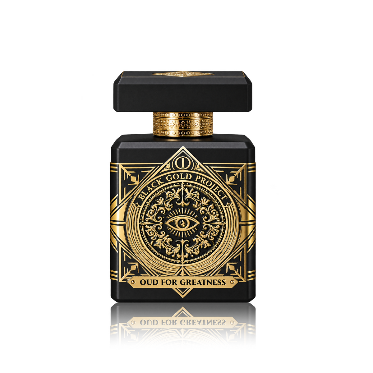 A luxury perfume bottle from the 'Black Gold Project' with a matte black body and ornate gold detailing, featuring a central eye motif and the text 'Oud for Greatness'.